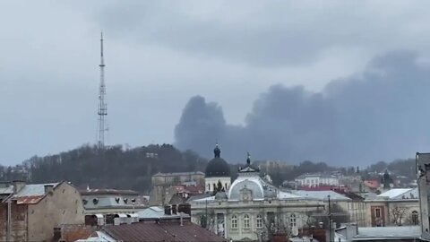 Smoke rises in the sky in Lviv as oil product base came under attack : 3 powerful explosions