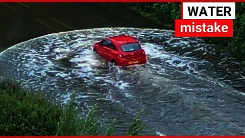 Two men trapped after driving into flood