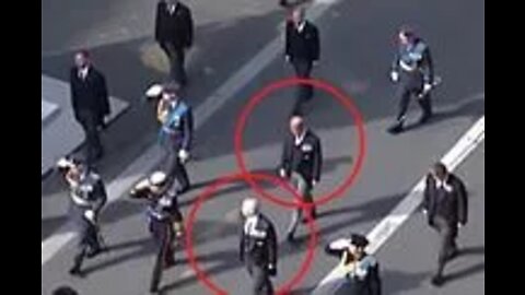 Prince Harry looks down as he passes Cenotaph while King Charles and William salute