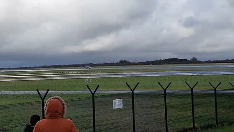 Eastern Airways BAe Jetstream 41 landing at MAN Manchester Airport UK. Plane Spotting in wet weather