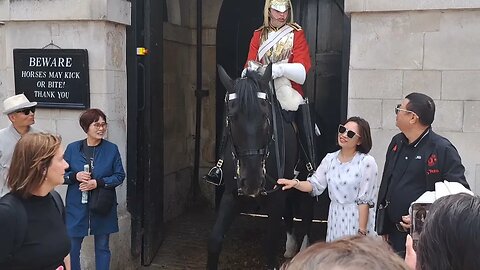 The guard tells her Don't hold the reins #horseguardsparade