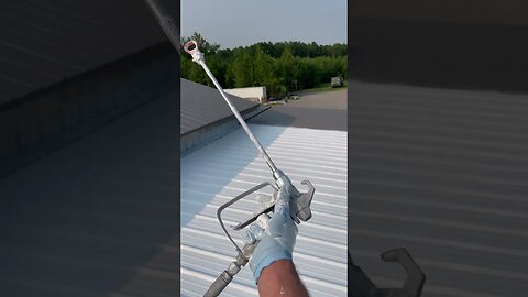 Spraying the roof white for the solyndra solar panels