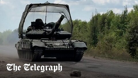 Ukrainian tanks seen driving in Sumy region near border with Russia