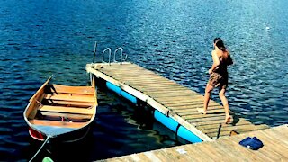 September slow motion running dive into lake