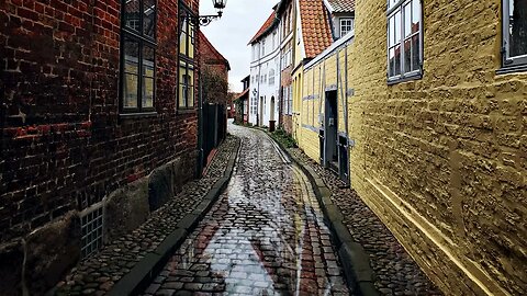 Rain over the beautiful cobblestone street In der Techt in Altstadt, Lüneburger