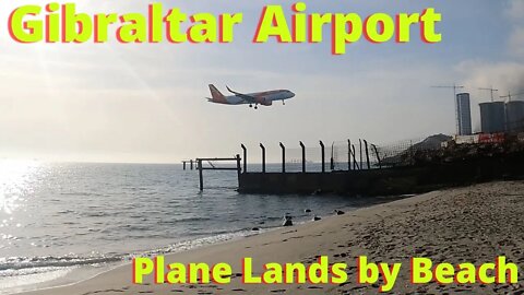 Plane Lands Next to Beach at Gibraltar Airport