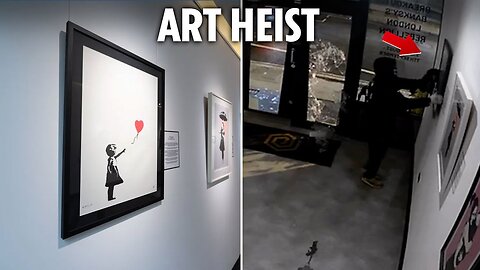 Crooks 'STEAL Banksy's "Girl with balloon" after smashing through glass at gallery'