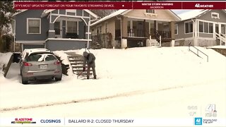 Kansas City homeowners clean up snow from recent winter storm