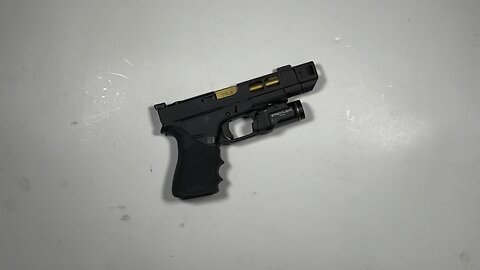 Custom Glock 48 Pistol with Lighting Cuts in Slide to Match Compensator