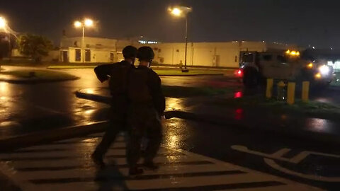 U.S. Marines with 3rd Maintenance Battalion Conduct a base damage assessment during a typhoon