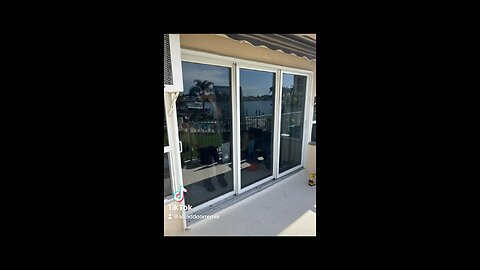 Hurricane impact sliding glass door repair; roller replacement and track refurbishing