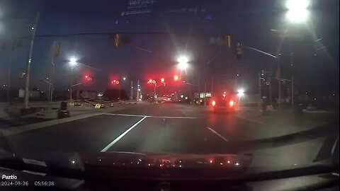 Pickup truck runs red light in style