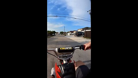 Bike leans hard right on wheelie