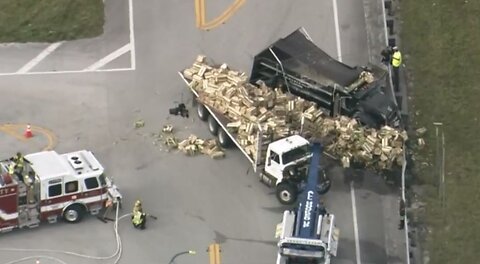 Semi truck hauling corn involved in crash