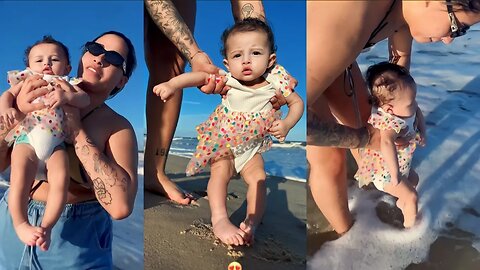 MELANIE PISANDO NA AREIA DA PRAIA PELA PRIMEIRA VEZ