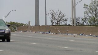 Hundreds of face masks found scattered along I-90 between West 140th Street and Warren Road