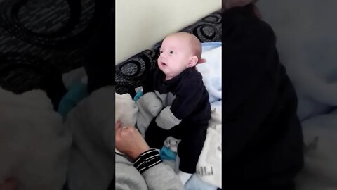 Cute Baby Boy Playing A Funny Game