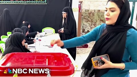 Iranians voting in a run-off presidential election