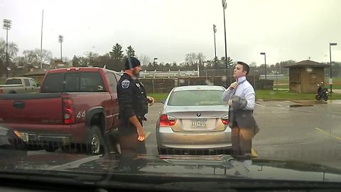 Police officer helps UW-Stout student tie up some loose ends