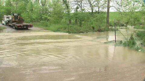 Breach in dam at Lake Waxhoma