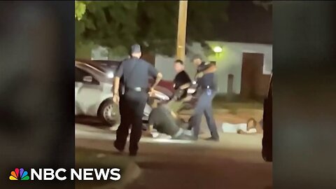 Video appears to show Ohio officer kicking kneeling man