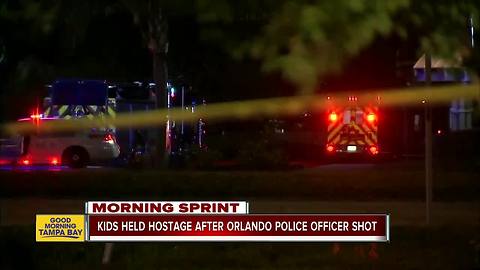 Kids held hostage after Orlando police officer shot