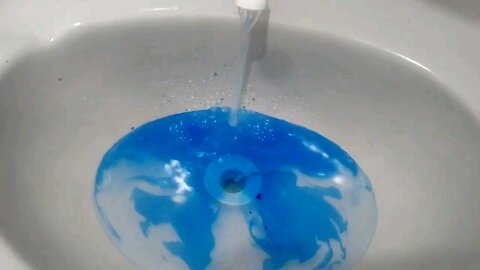 Blue water coming out of the bathroom tap