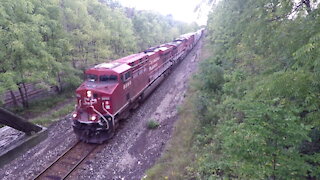 CP 8895 & CP 8650 Engines Manifest Train Eastbound At Denfield Road Bridge Side View