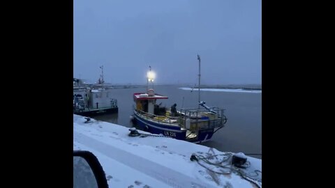 fishing boats leaving deep sea