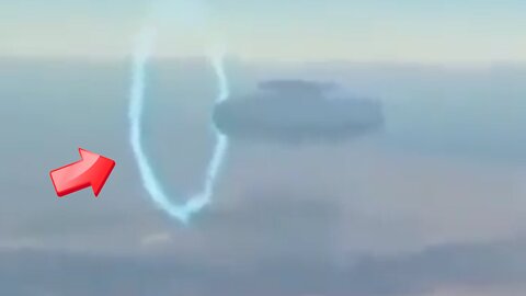 A saucer-shaped UFO warps through time in the sky above [Space]