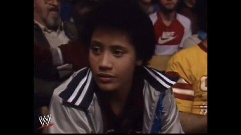 11 year old Dwayne “ The Rock “ Johnson sitting in crowd watching his dad wrestle in 1984