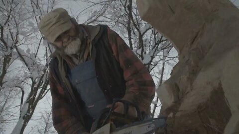 Cutting A Wooden Bear With Chainsaw