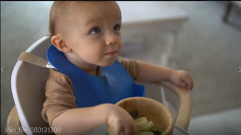 11 months old baby eating his foods