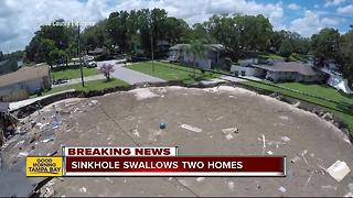 Pasco sinkhole stabilizes after gobbling up 2 houses, threatening 9 more