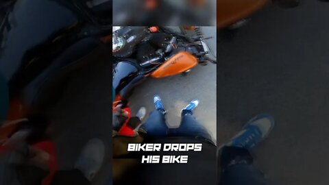 Biker DROPS his bike...