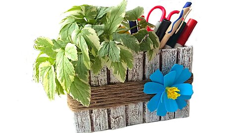 DIY flower pot made of jute and cardboard