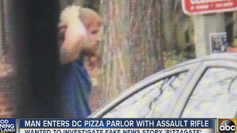 Man enters DC pizza parlor with assault rifle