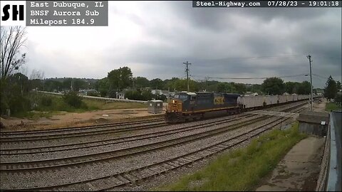 CSX 5267 Leading EB Herzog Ballast Hoppers in East Dubuque, IL on July 28, 2023