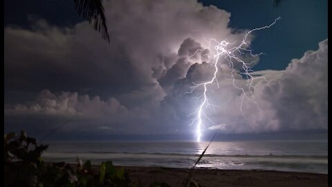 Amazing Night Time Thunderstorm Over the Ocean