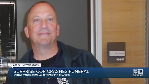 Surprise cop, accused of crashing a funeral, remains on the job