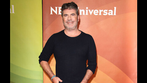 Simon Cowell starting to walk again