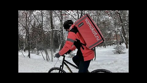 Look at winter Siberia! Cyclists. camels. deer, and skiers