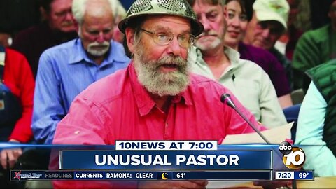 Man with strainer on head gives opening prayer?