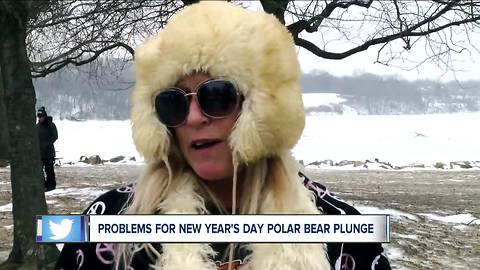 Local polar bear plungers go home without taking a plunge