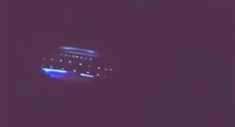 Clear MULTI-STORIED UFO with Beautiful colors and Multiple windows on a clear night?!?!?!