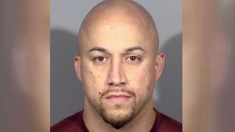 Vegas officer arraigned on manslaughter charge in chokehold death