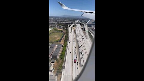 AEROPLANE LAND TO AMERICAN AIRPORT..VIEW OF USA