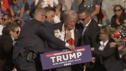 VIDEO HERE - GUNSHOTS RING OUT AT TRUMP RALLY. LOOKS LIKE HE WAS HIT!