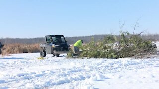 Volunteers make fish habitats on White Clay Lake