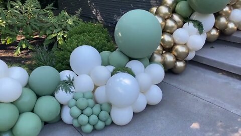 Organic Balloon Garland installed along a walkway